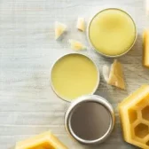 A table with three different types of beeswax.